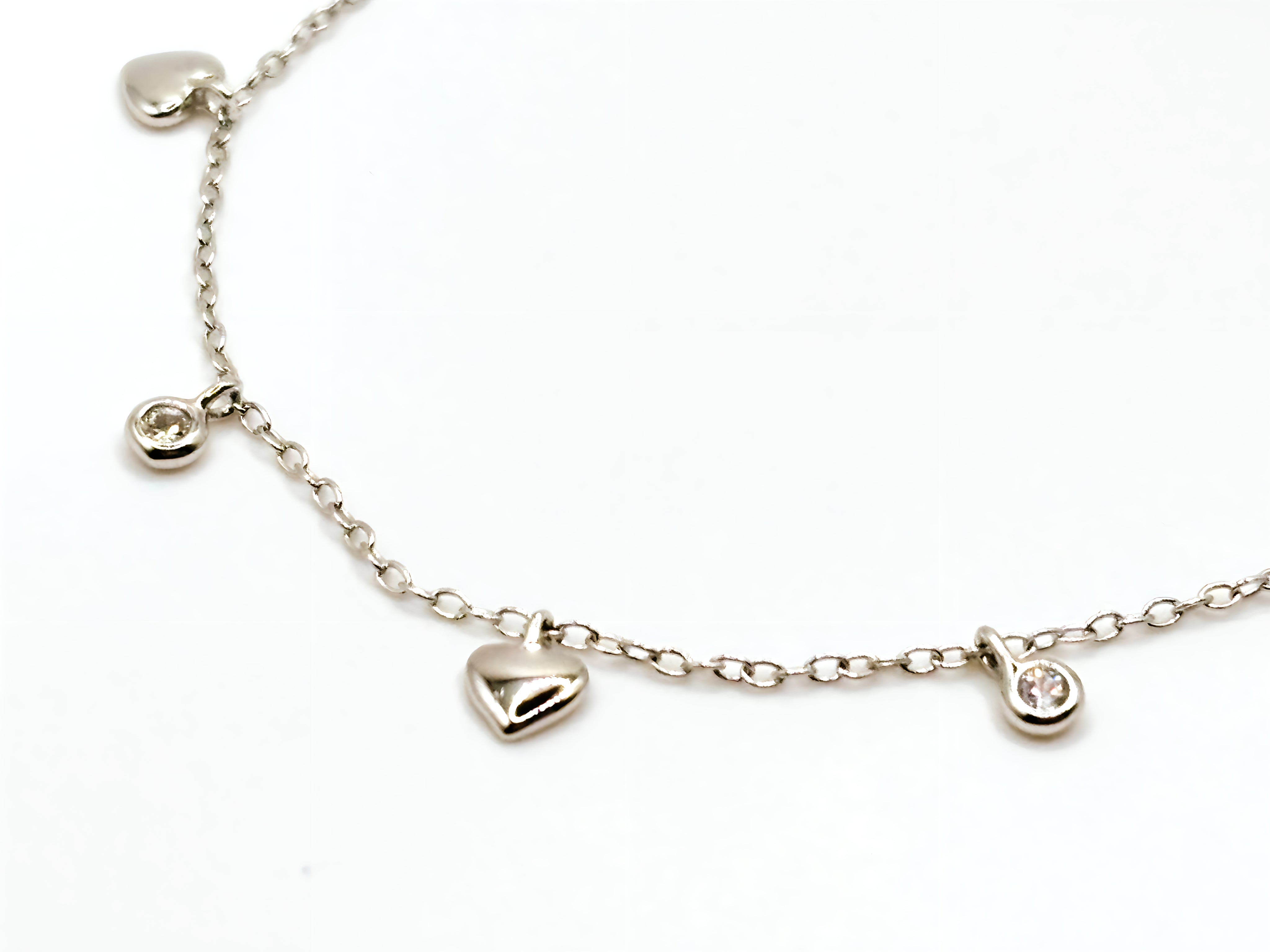 Pulsera con Corazones y Cirnones de Plata 925